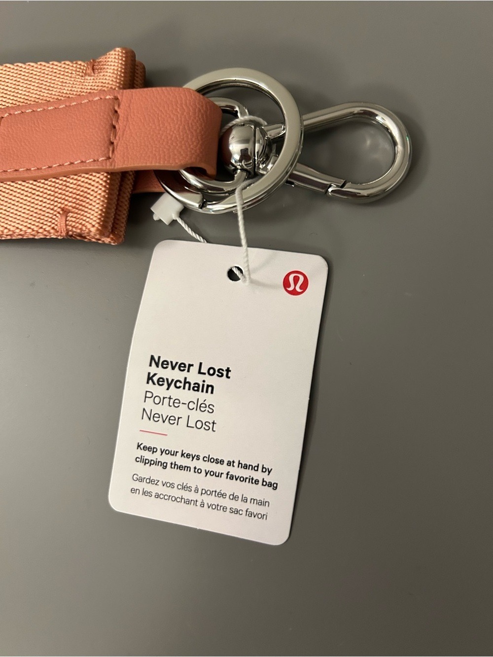 Lululemon Never Lost Keychain NWT Coral Key Fob Strap with Yellow Logo - Picture 3 of 4